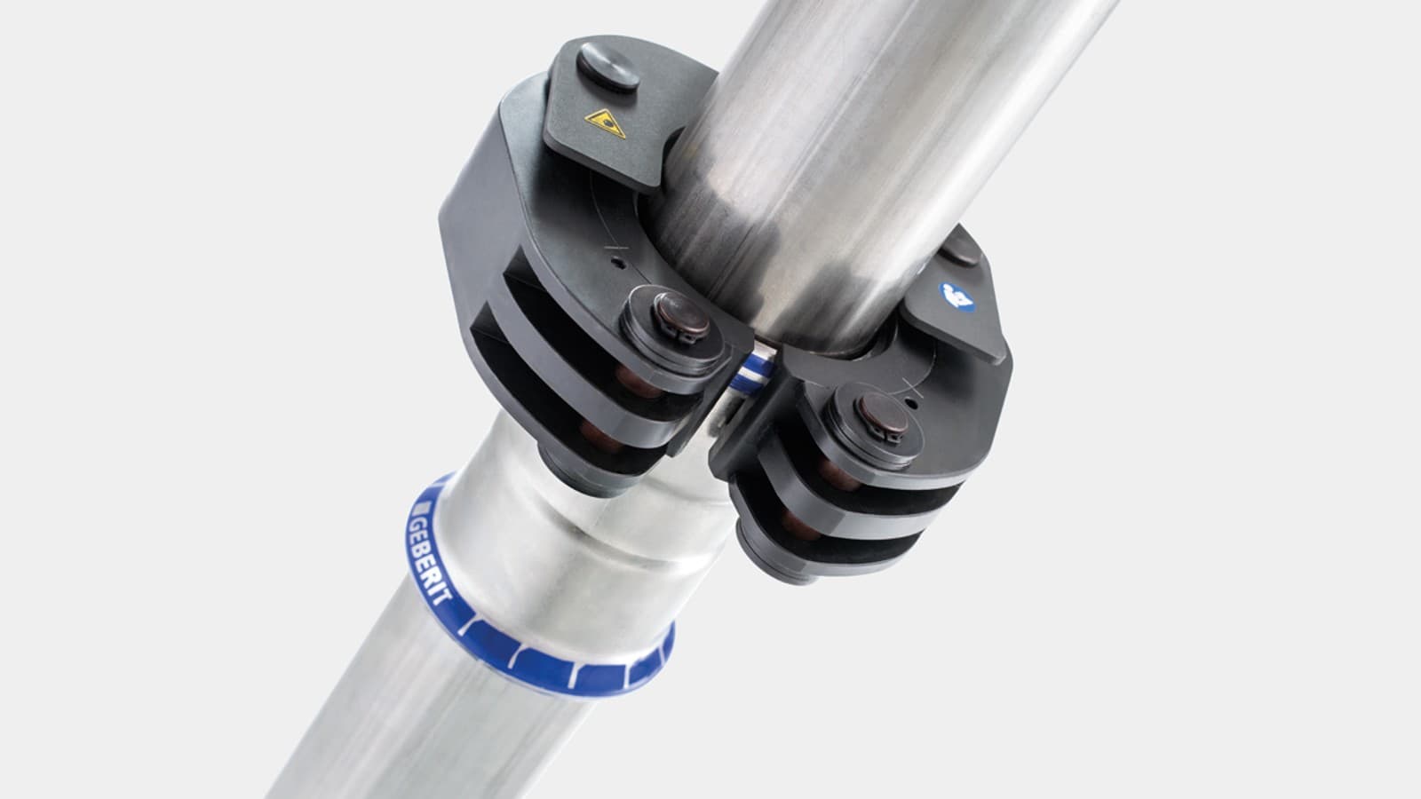 Защелкивающийся механизм фиксирует прижимное кольцо Geberit на фитинге Geberit Mapress Защелкивающийся механизм фиксирует прижимное кольцо Geberit на фитинге Geberit Mapress